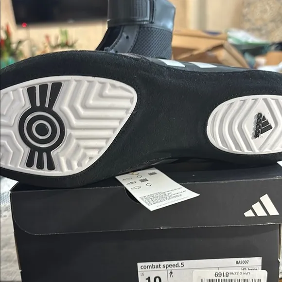 Adidas Black and White High-Top Athletic Shoes