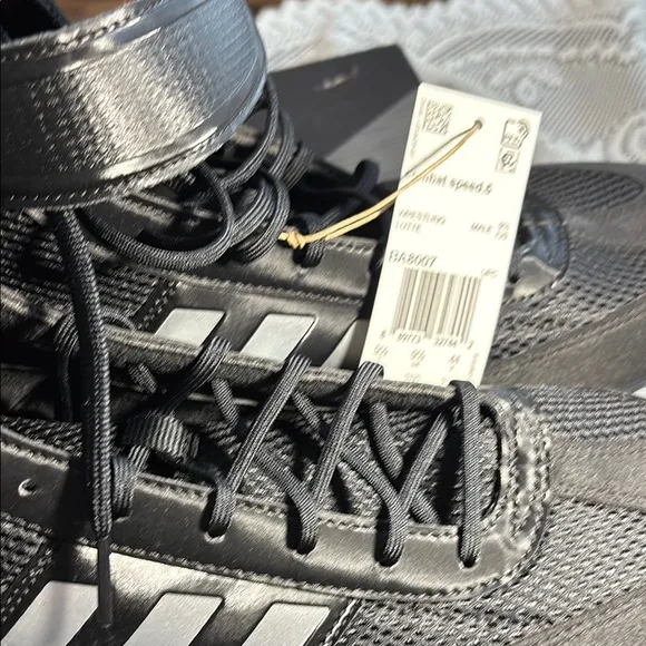 Adidas Black and White High-Top Athletic Shoes