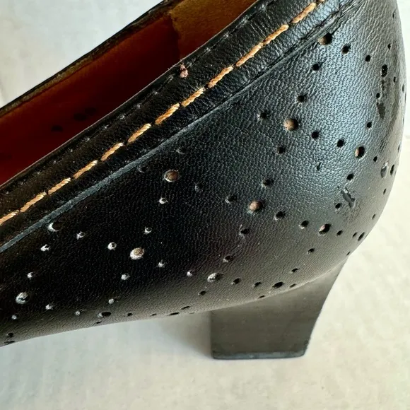 Bruno Magli -Perforated Genuine leather shoes with 2” heel.Made in Italy.Size 9