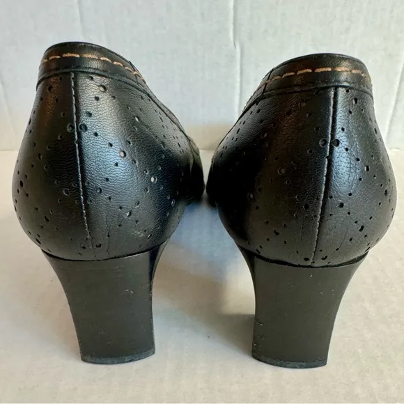 Bruno Magli -Perforated Genuine leather shoes with 2” heel.Made in Italy.Size 9