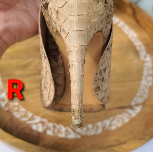 Camilla Skovgaard Python sz 38. Please refer to all photos
