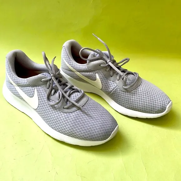 Light gray/white Nike athletic shoes