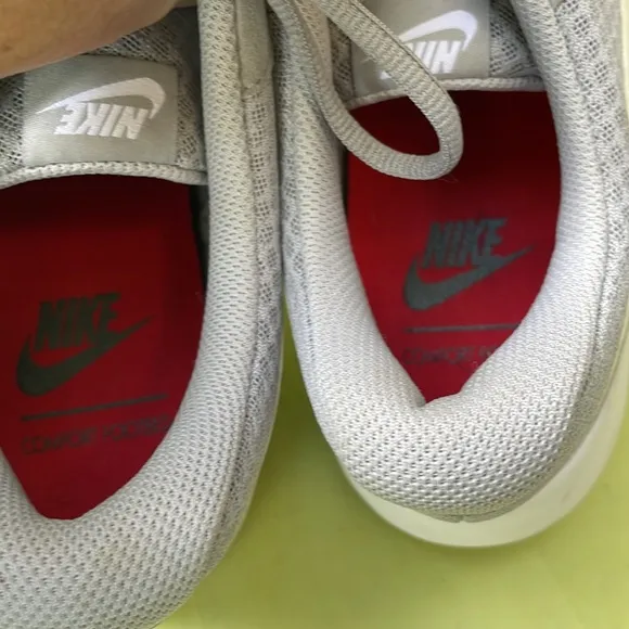 Light gray/white Nike athletic shoes