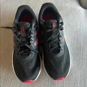 NEWBalance Black and Red Athletic Running Shoes with Breathable Mesh