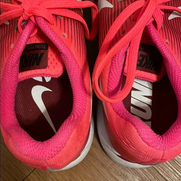 Nike Pink and White Zoom Running Athletic Shoes with Sleek Design
