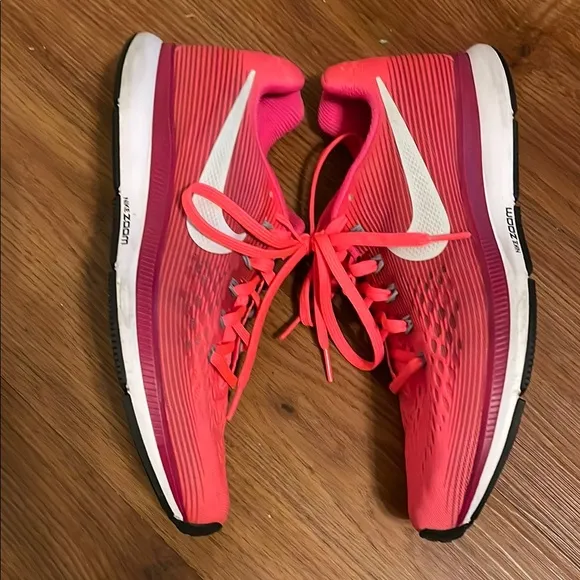 Nike Pink and White Zoom Running Athletic Shoes with Sleek Design