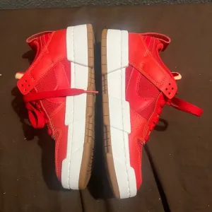Nike Red and White Athletic Shoes Dunk Low Disruptive fits kids size 4.5 new