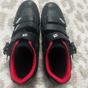 Peloton Black Cycling Shoes with Red Accents. 46-Men 12