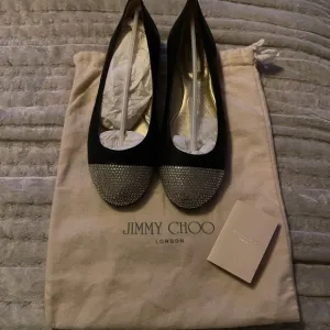 Preloved Jimmy Choo flat shoes size 39 excellent condition never worn.