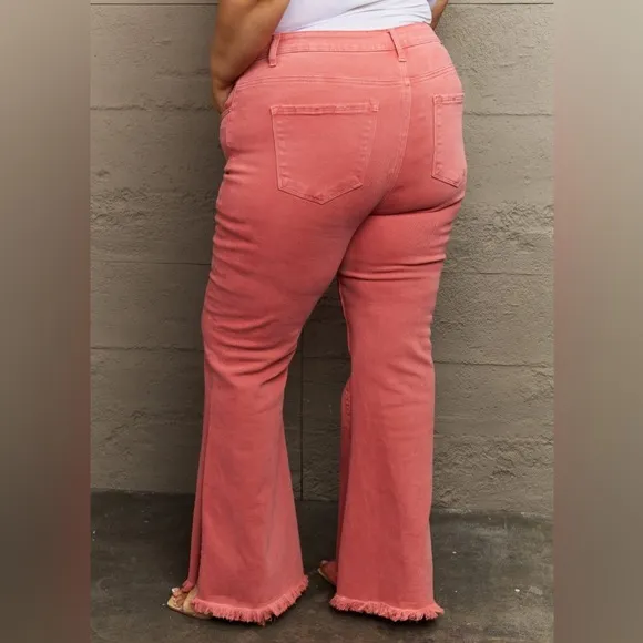 RISEN Bailey Plus Size High Waisted Side Slit Flare Jeans in Coral Pink