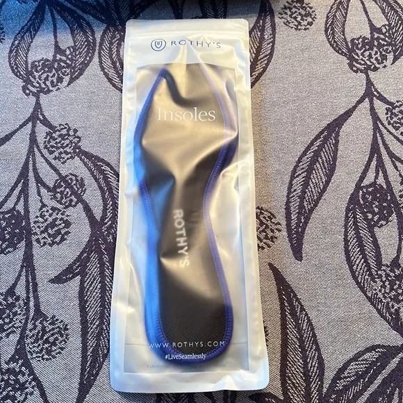Rothy’s 10.5 Black Solid The Point and extra set of insoles.