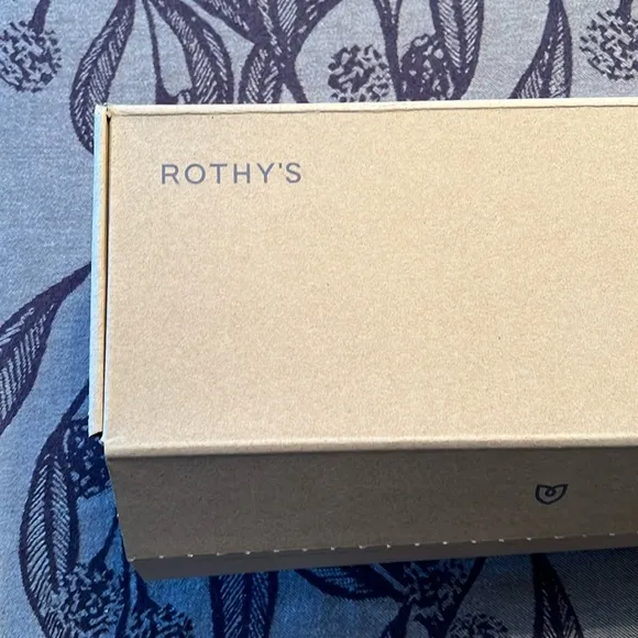 Rothy’s 10.5 Black Solid The Point and extra set of insoles.
