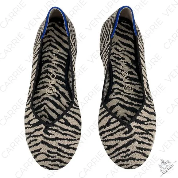Rothy’s The Flat in Black Zebra Neutral Tapue Tan Printed Sustainable Flats 6.5