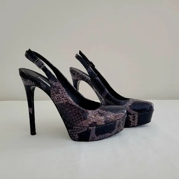 Vera Wang Lavender snakeskin leather high heels.